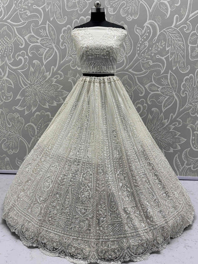 Gleaming White Sequins Net Engagement Wear Lehenga Choli With Dupatta